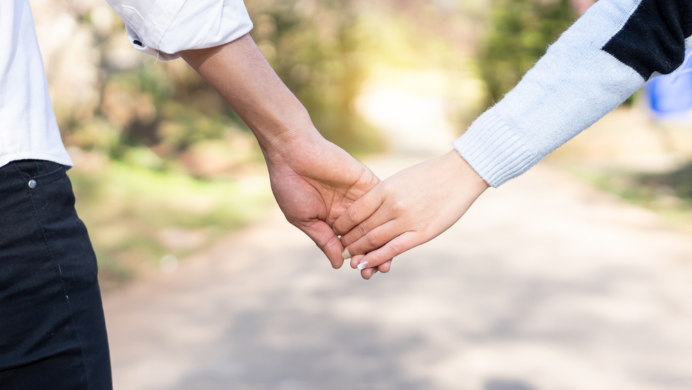 couple holding hands